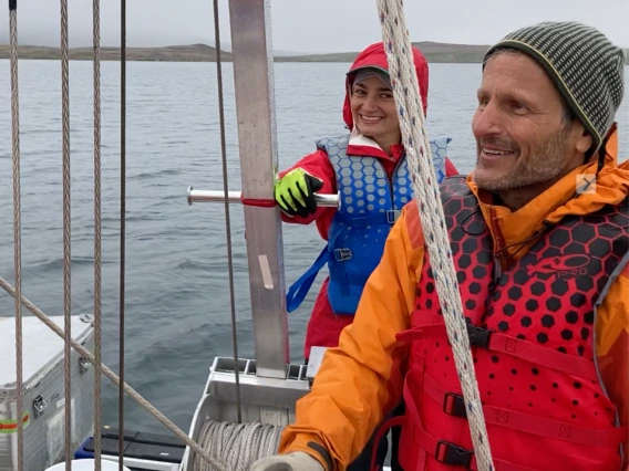 The authors of the paper, Ellie Broadman and Darrell Kaufman, assisting on a lake coring platform in northwest Alaska, August 2022