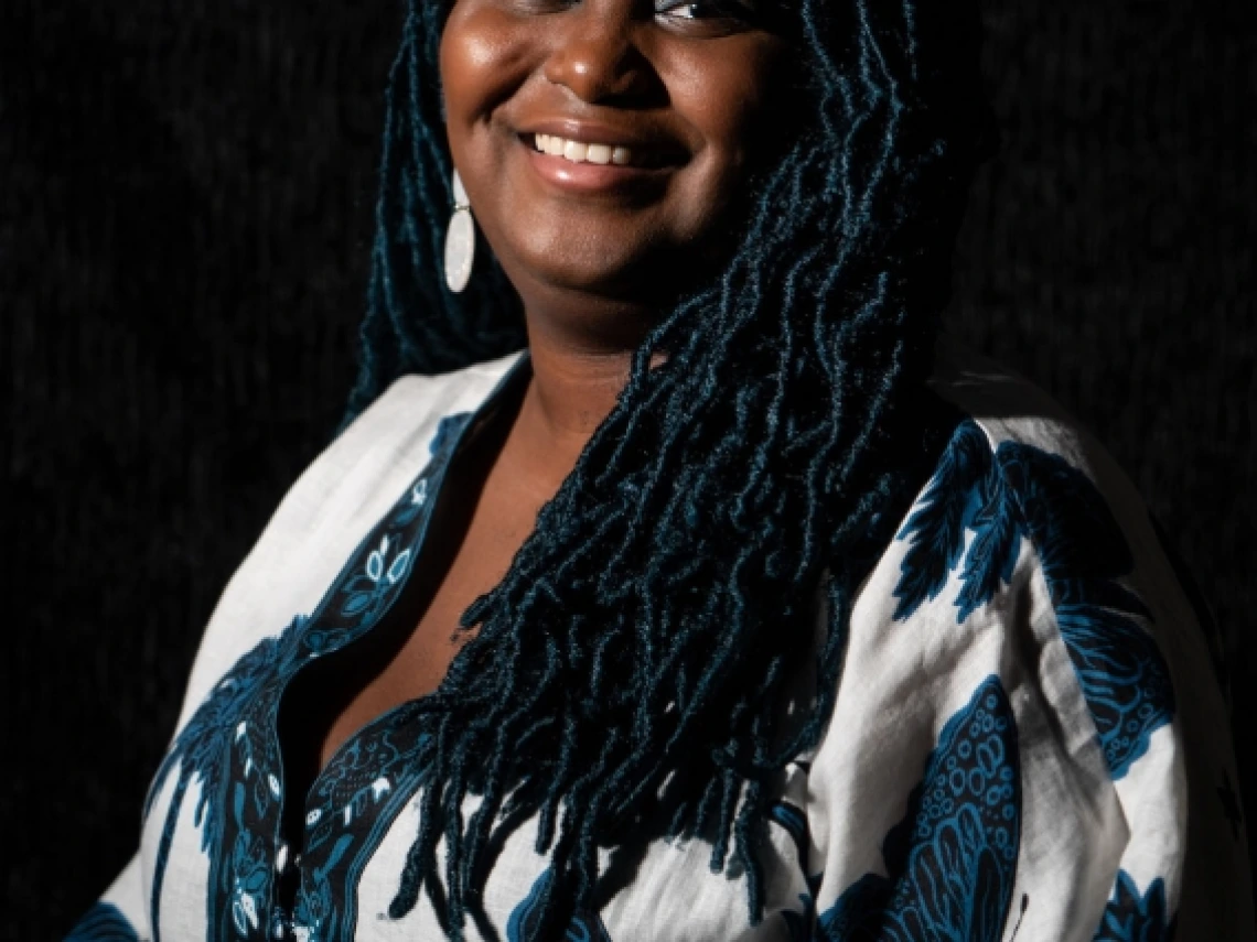 woman in a blue and white shirt